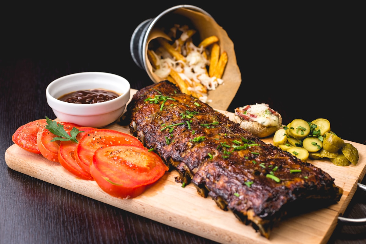 Slow-stewed oxtail with tomato and pickles