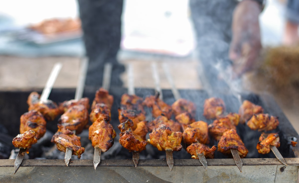 Skewered chicken slow-smoked over open charcoal